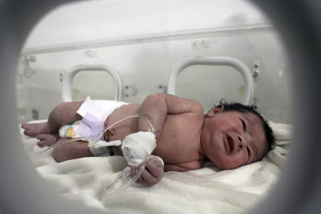 Newborn saved from rubble in quake-hit Syria