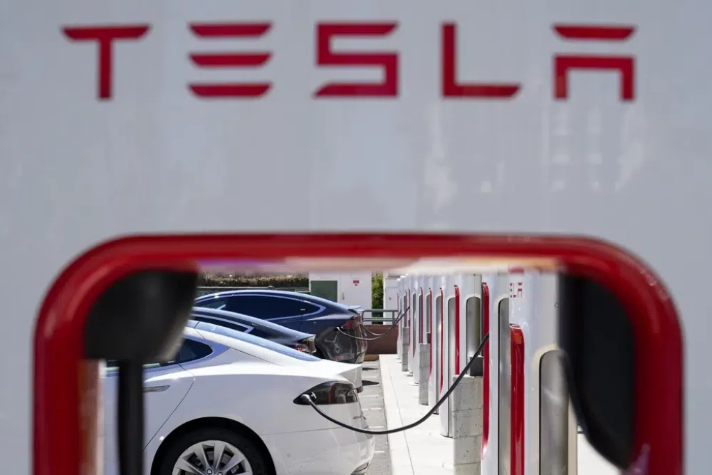 Tesla to make some EV chargers available to all